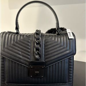 Black quilted Aldo bag that can be used as a crossbody with included strap.